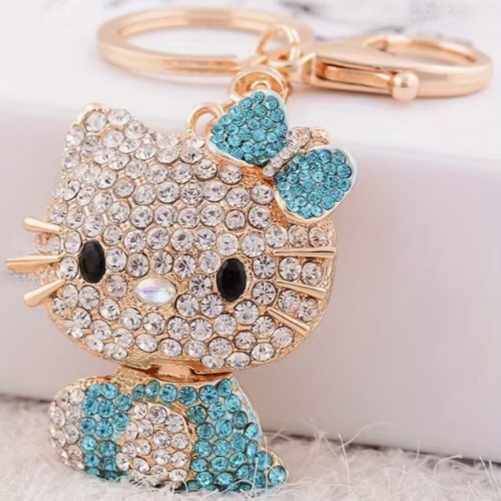 Hello Kitty Rhinestone Key Chain Bling Bag Charm Blue +Gold Purse Fob Head Moves